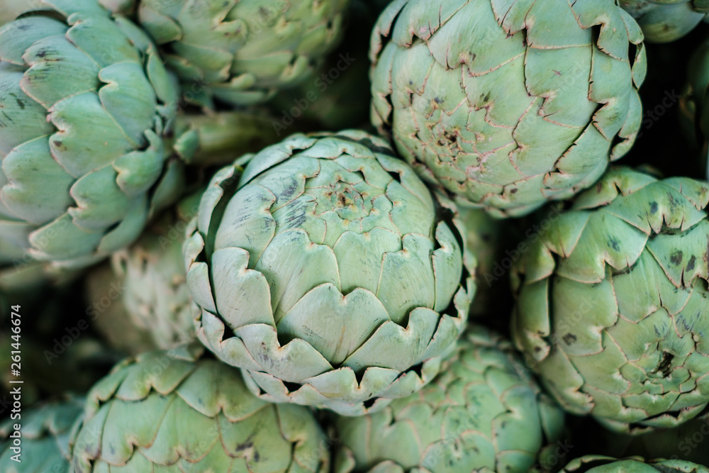 Fototapeta premium fresh artichokes at food market - artichoke -