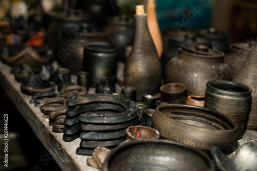  Burnt black ceramics. Burnt clay pots and plates, dishes - Image