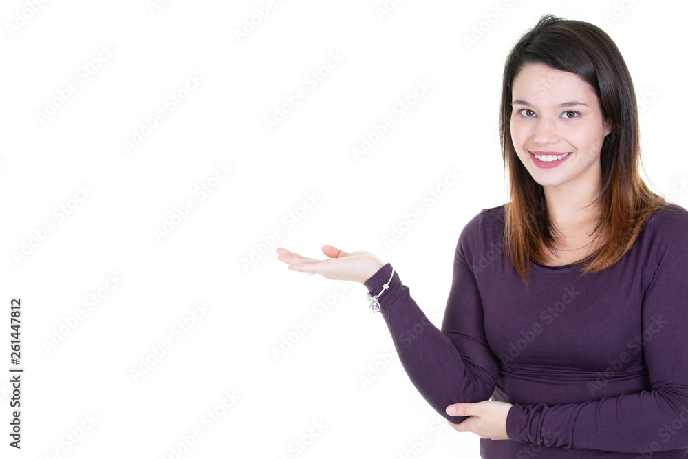 Young businesswoman in purple sweater showing something in white copy space Young businesswoman in purple sweater showing something in white copy space