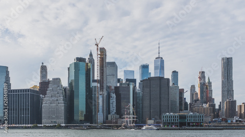 Skyscrapers of downtown Manhattan over East River  viewed from Brooklyn Bridge Park  in Brooklyn  New York  USA
