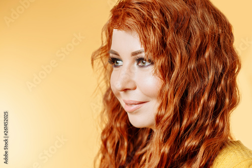 Close up portrait of young beautiful redhead girl