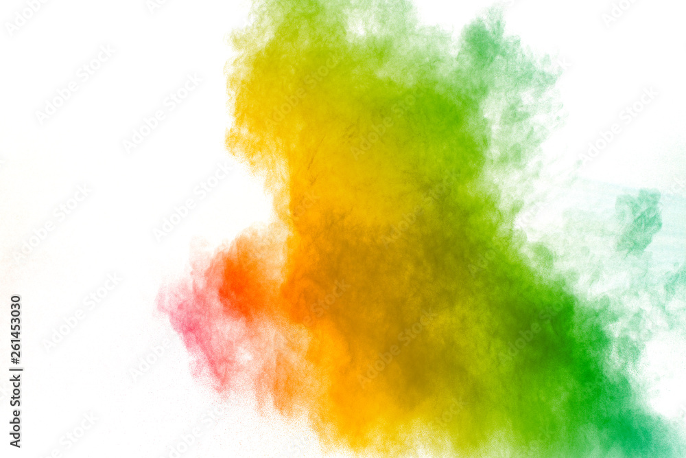 Colorful powder explosion on white background. Abstract pastel color dust particles splash.