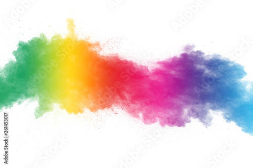 Colorful powder explosion on white background. Abstract pastel color dust particles splash. © Pattadis