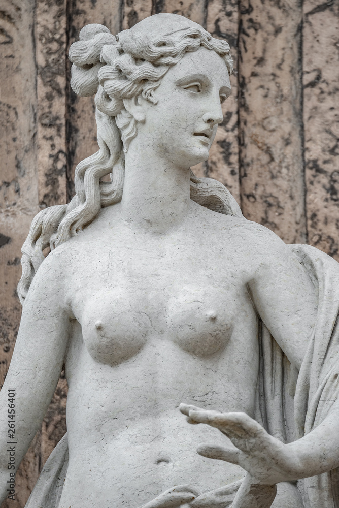 Statue of ancient sensual naked Renaissance Era woman in Potsdam, Germany, details, closeup Statue of ancient sensual naked Renaissance Era woman in Potsdam, Germany, details, closeup