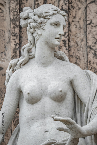 Statue of ancient sensual naked Renaissance Era woman in Potsdam, Germany, details, closeup