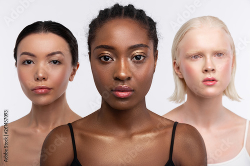 Принти на полотні Three women with different complexion posing together