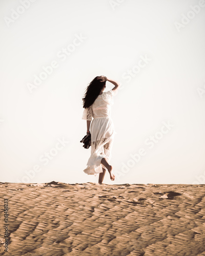Young woman in lost in the desert