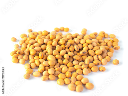 Raw dried soybeans isolated on white background.