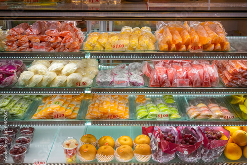 Variety of tropical fruits on display in a display fridge in Singapore