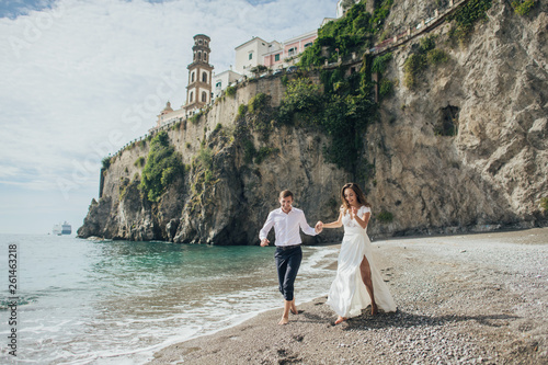Young wedding couple having fun Time  in Italy.
