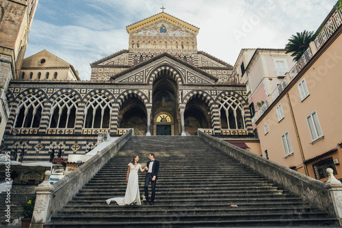 Young wedding couple having fun Time  in Italy.