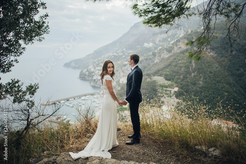 Canvas Print Young wedding couple having fun Time  in Italy.