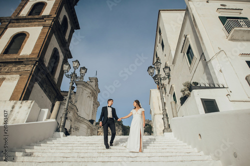 Young wedding couple having fun Time  in Italy.