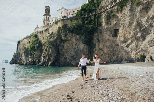 Young wedding couple having fun Time  in Italy.