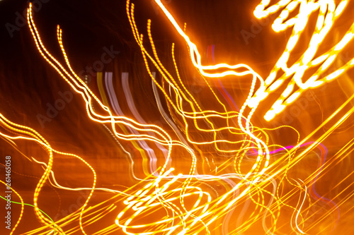 creative photography with unusual pattern of dancing light or neon in chaotic multi colored lines on abstract background. concept of unique desktop wallpaper or screensaver. copy space, texture, blur