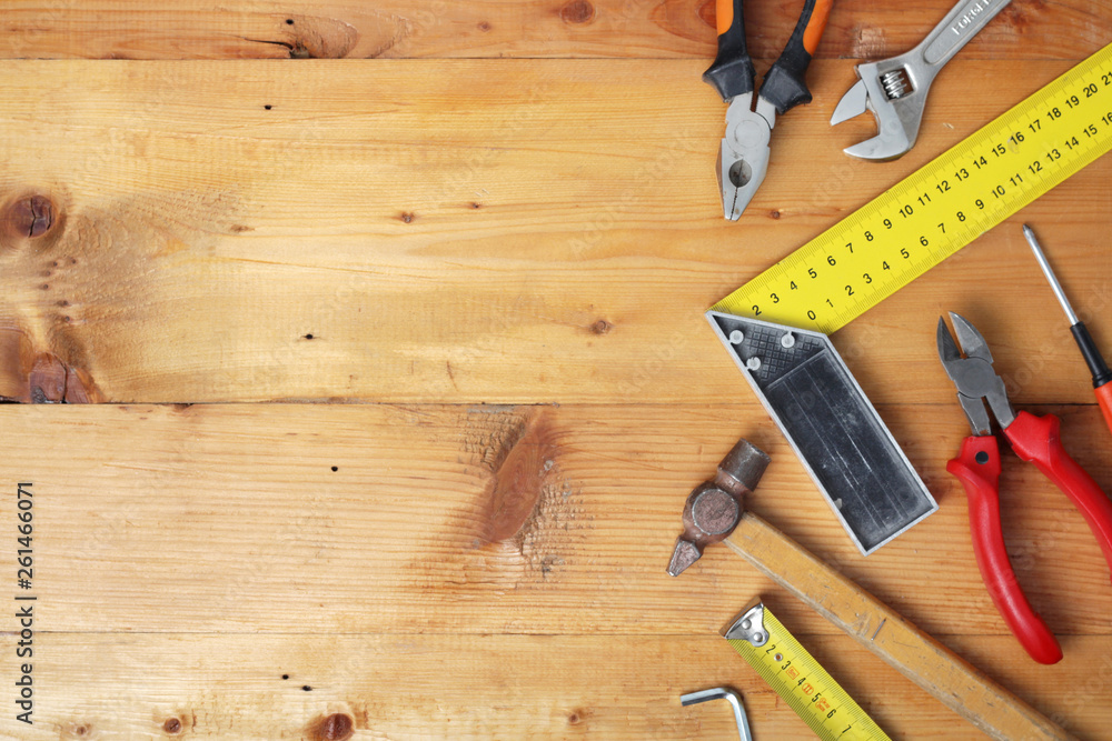 Working tools on wooden rustic background with copy space Working tools on wooden rustic background with copy space