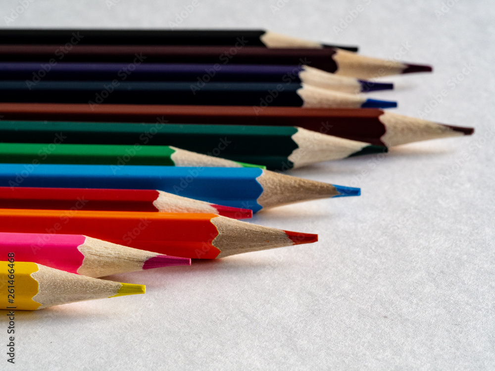 Obraz premium Color pencils on the table on white background.