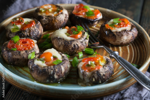 Mushrooms stuffed with mozzarella and tomatoes