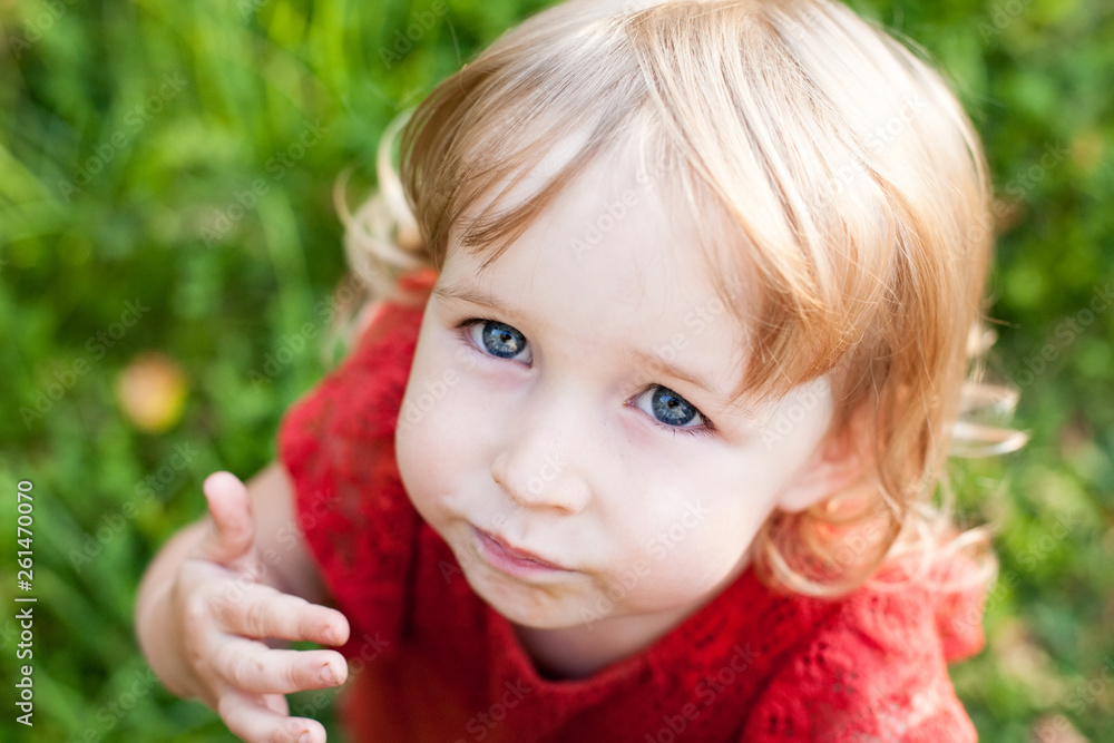 funny kid girl emational face closeup top view funny kid girl emational face closeup top view