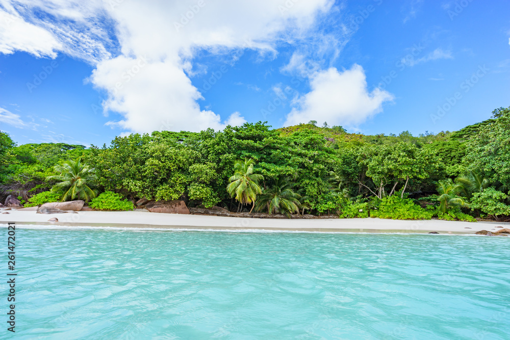 Looking to the coast of anse lazio from the water, praslin, seychelles 8