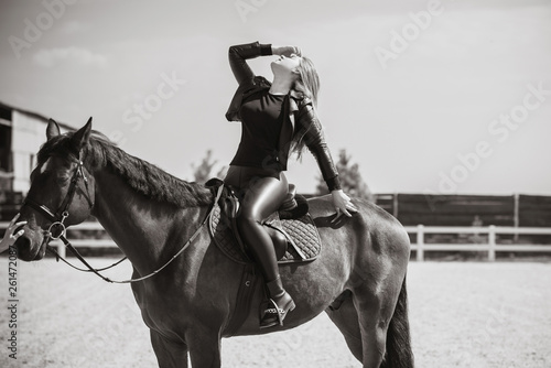 Canvas Print Spring - summer season, concept of hobby, Woman with a horse on a nature, relati