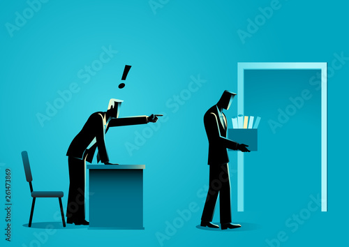 Businessman bringing personal items in box