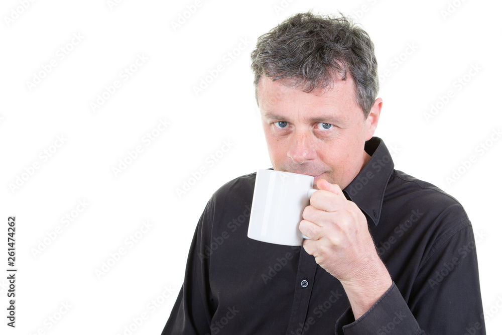 Man in office attire holding drinking coffee mug Man in office attire holding drinking coffee mug