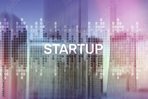Startup concept with double exposure diagrams blurred background.