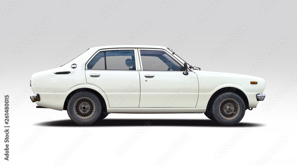 Classic white Japanese family car isolated on white