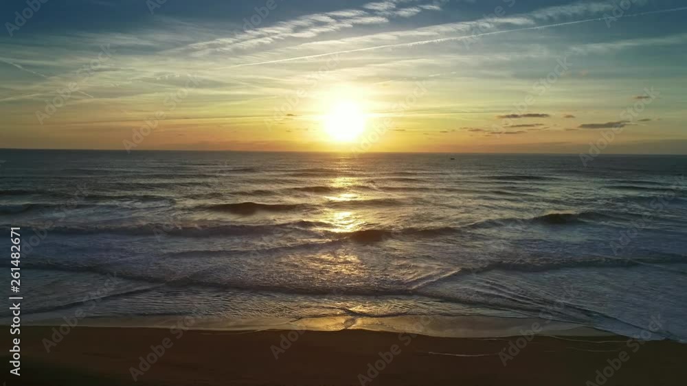 Aerial view on big waves of Atlantic ocean and sunset sun, 4k Aerial view on big waves of Atlantic ocean and sunset sun, 4k