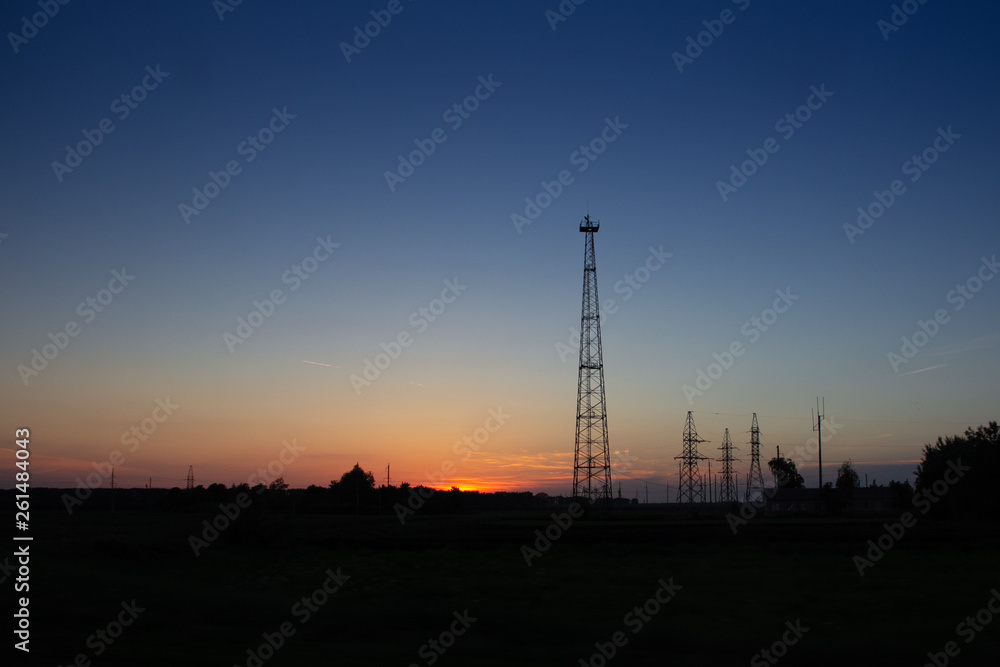 cell tower at sunset
