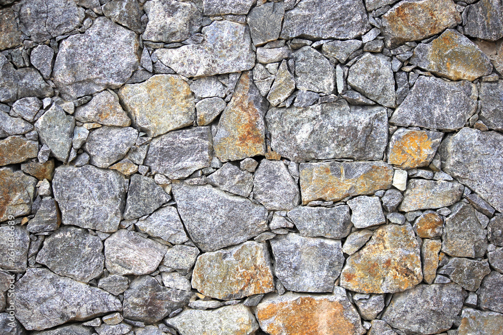 Texture of a stone wall. Old castle stone wall texture background. Stone wall as a background or texture. Part of a stone wall, for background or texture