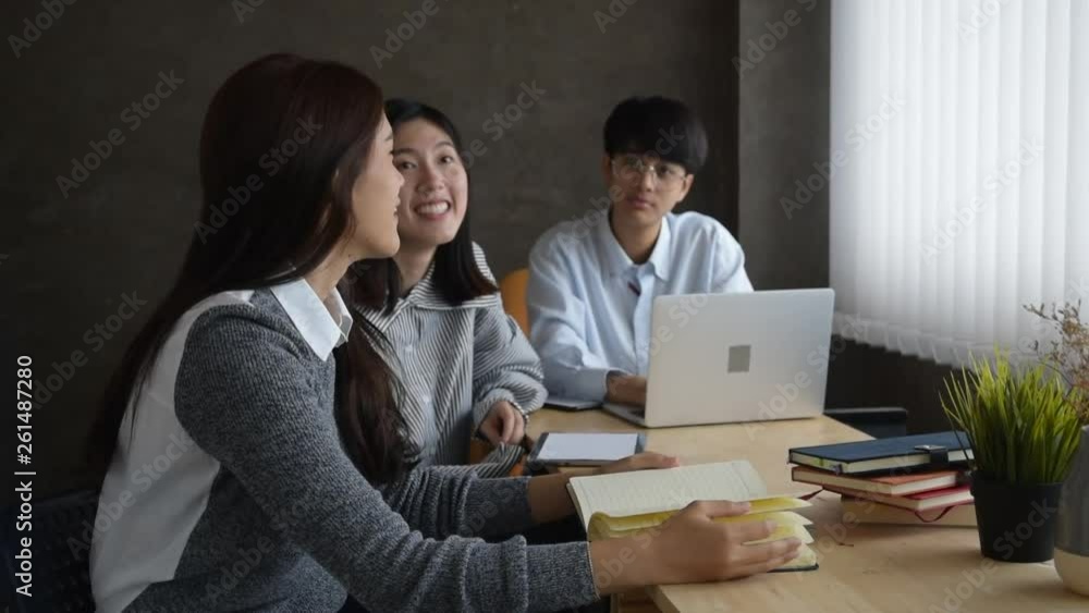 Student group reading and sharing knowledge together at meeting room Student group reading and sharing knowledge together at meeting room