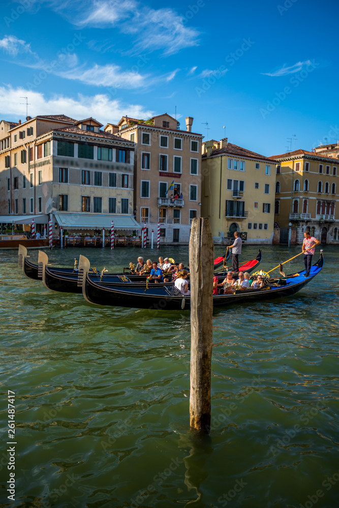 Fototapeta premium Venice street scene with romantic building canal and gondolas