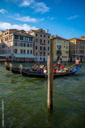 Venice street scene with romantic building canal and gondolas © derege