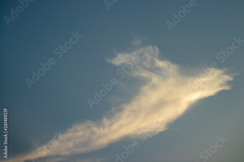 Abstract blurred background Blue sky with white clouds in sunlight. © flying creature