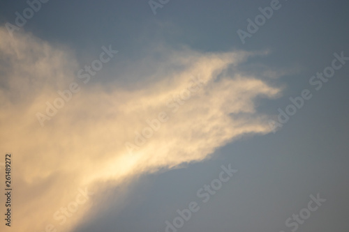 Abstract blurred background Blue sky with white clouds in sunlight. © flying creature
