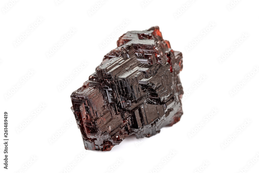 Macro stone Garnet mineral in rock on a white background Macro stone Garnet mineral in rock on a white background