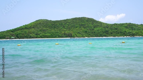 Holiday relaxing vacation beach concept. Beautiful view tropical island of sea at Samsarn Island Sattahip, Thailand. Nature of blue clean ocean sea beach with summer sky clear view landscape.  photo