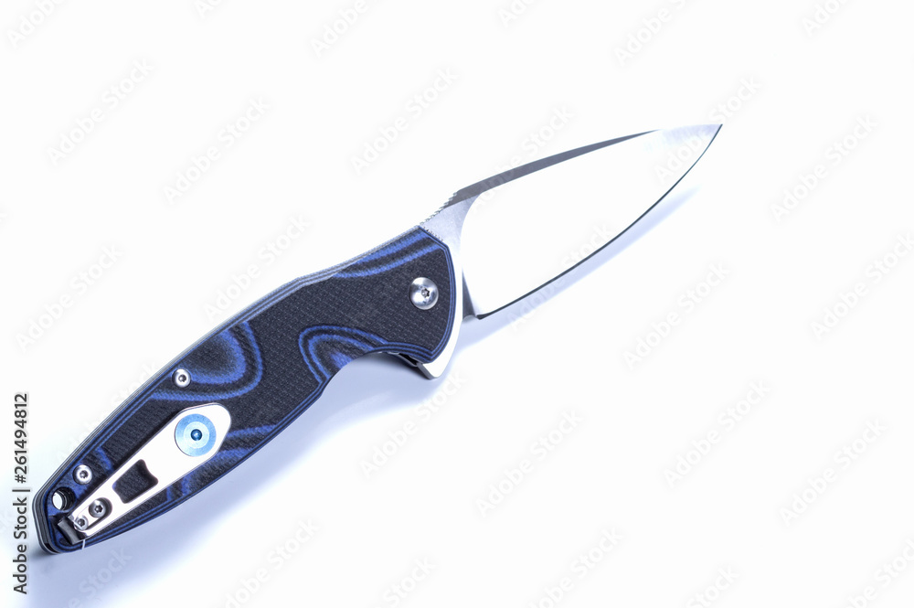 Obraz premium Knife in the unfolded form. Knife with a clip on the handle. Pocket knife.