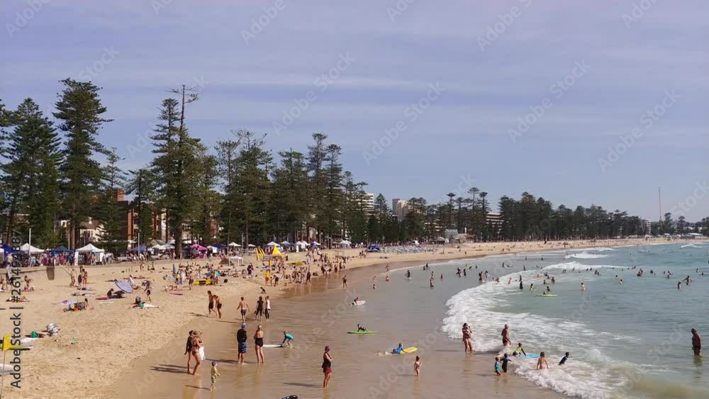 Summer holiday life style and recreation at famous Manly beach in Sydney on Northern beaches. Summer holiday life style and recreation at famous Manly beach in Sydney on Northern beaches.