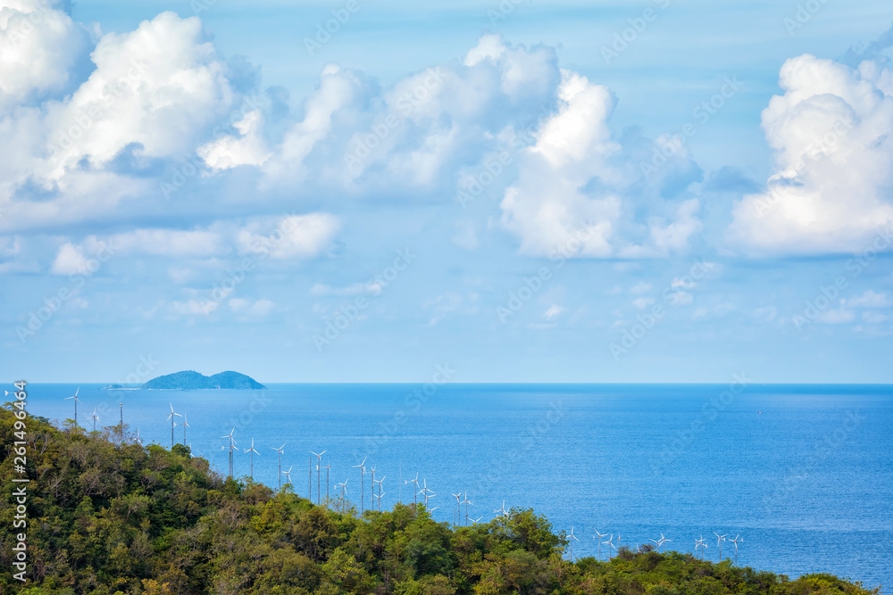 wind turbine generating electricity on mountain near sea. wind turbine generating electricity on mountain near sea.