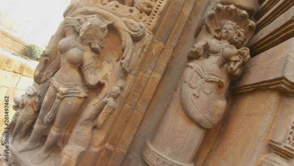 apsara dancer spirit and naga deity snake bas-reliefs on wall of ancient hindu temple Rajarani circular movement of camera Bhubaneswar Orissa apsara dancer spirit and naga deity snake bas-reliefs on wall of ancient hindu temple Rajarani circular movement of camera Bhubaneswar Orissa
