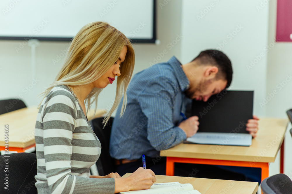 Smart students studying and learning taking notes Smart students studying and learning taking notes
