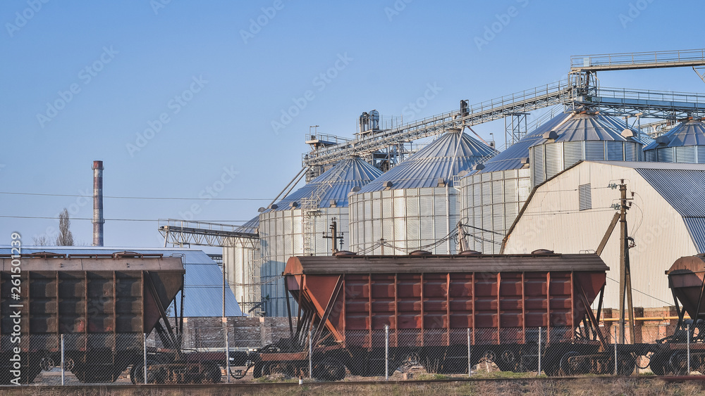 Loading grain at grain elevator. Loading grain at grain elevator.