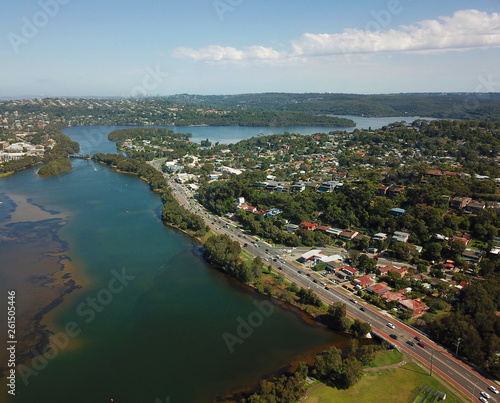 Aerial view of Narrabeen Lake. Sydney CBD in the background. © katacarix