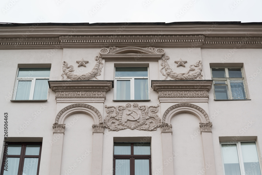Random building in Minsk, Belarus with communism symbols of Soviet era