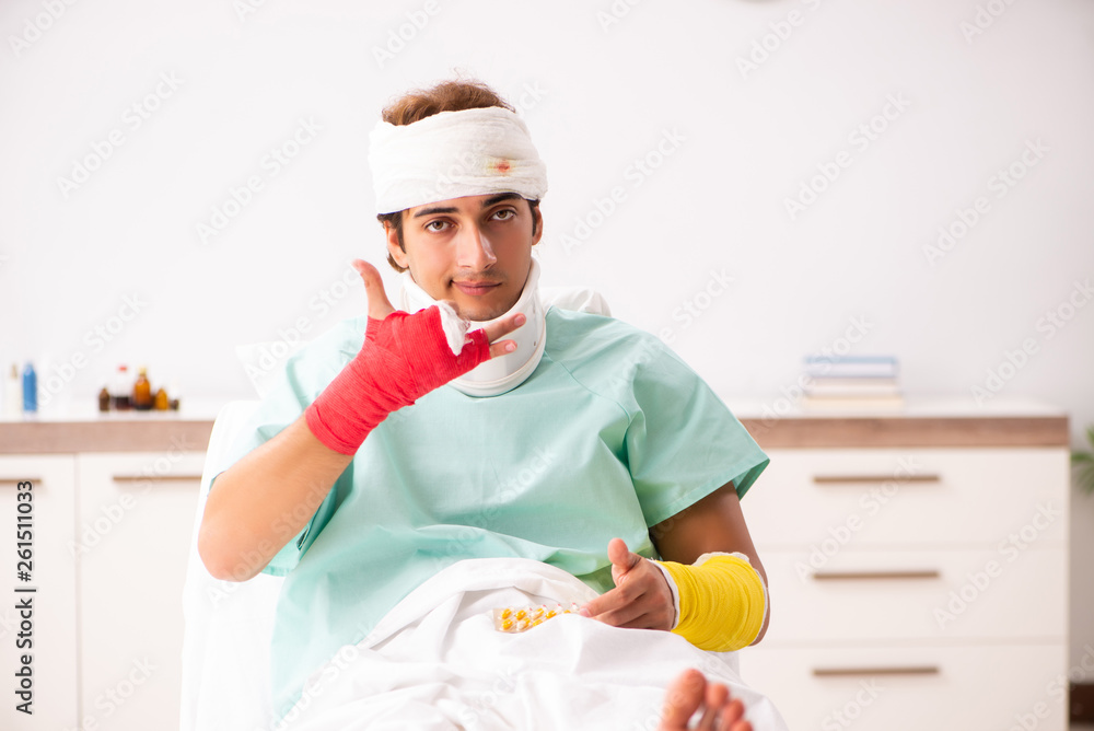 Young injured man staying in the hospital Young injured man staying in the hospital