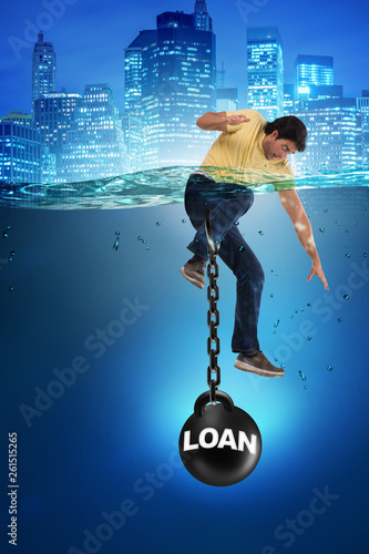 Young student in loan and debt concept © Elnur