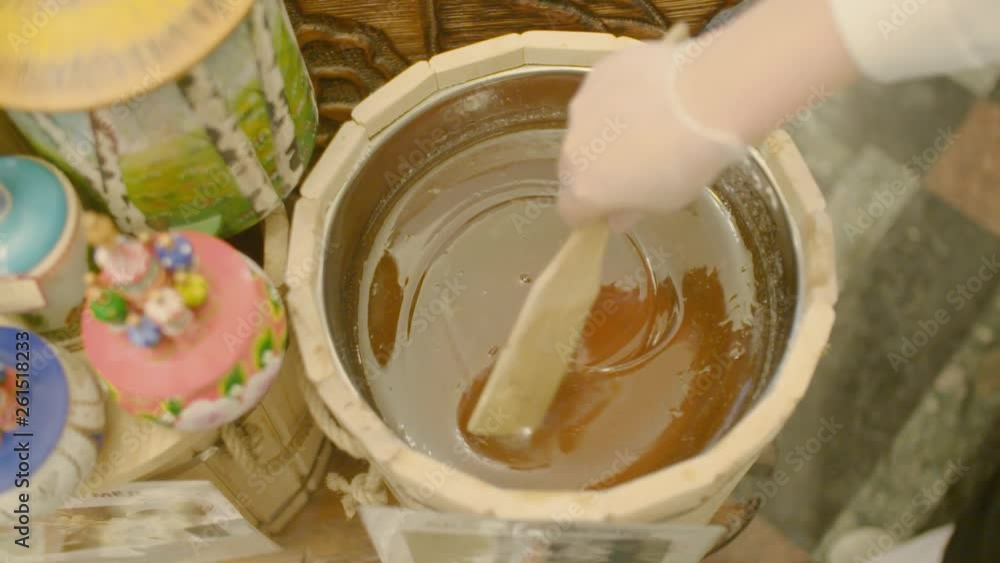 Sweet honey in wooden jar Sweet honey in wooden jar